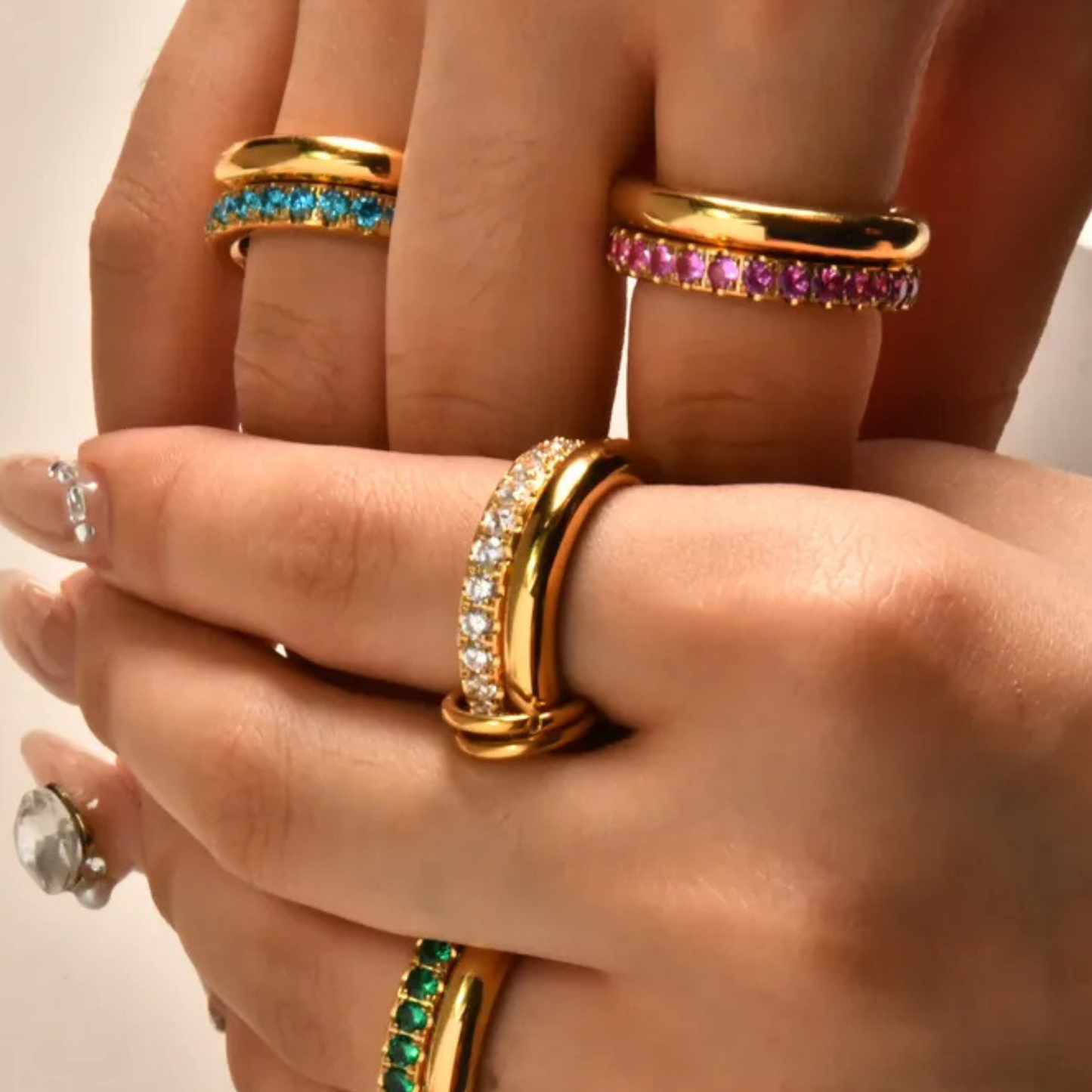 Gold ring Zircon Stone all around the ring wearing in hand