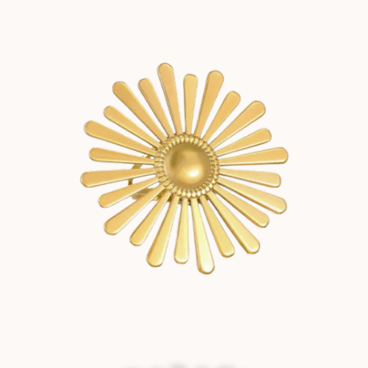 Gold sunburst design on a white background