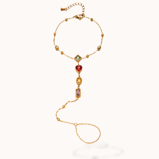 Gold necklace with colorful gemstones on a white background