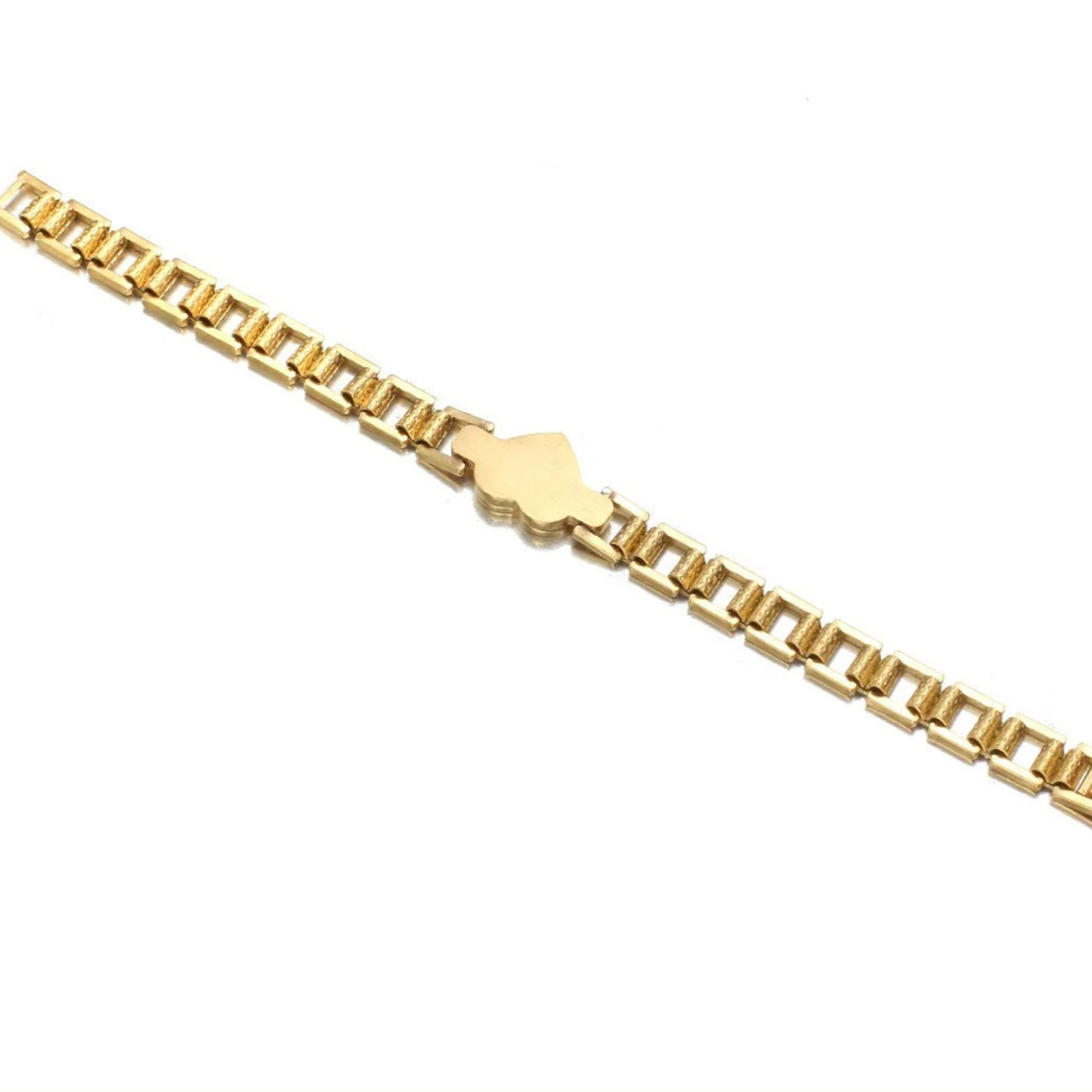 Gold bracelet on a white background