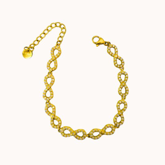 Gold bracelet on a white background