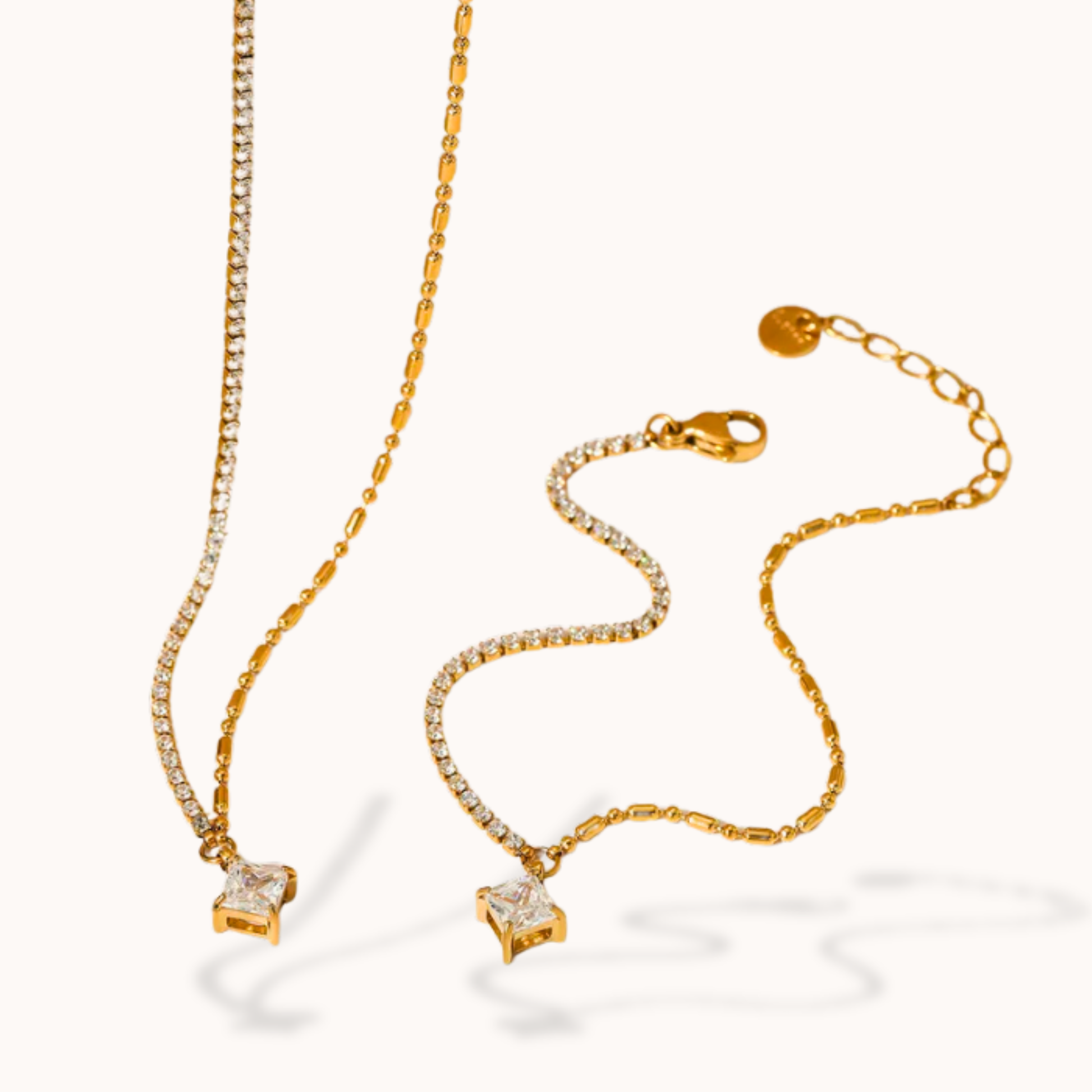 Gold necklace with star-shaped pendant on a white background