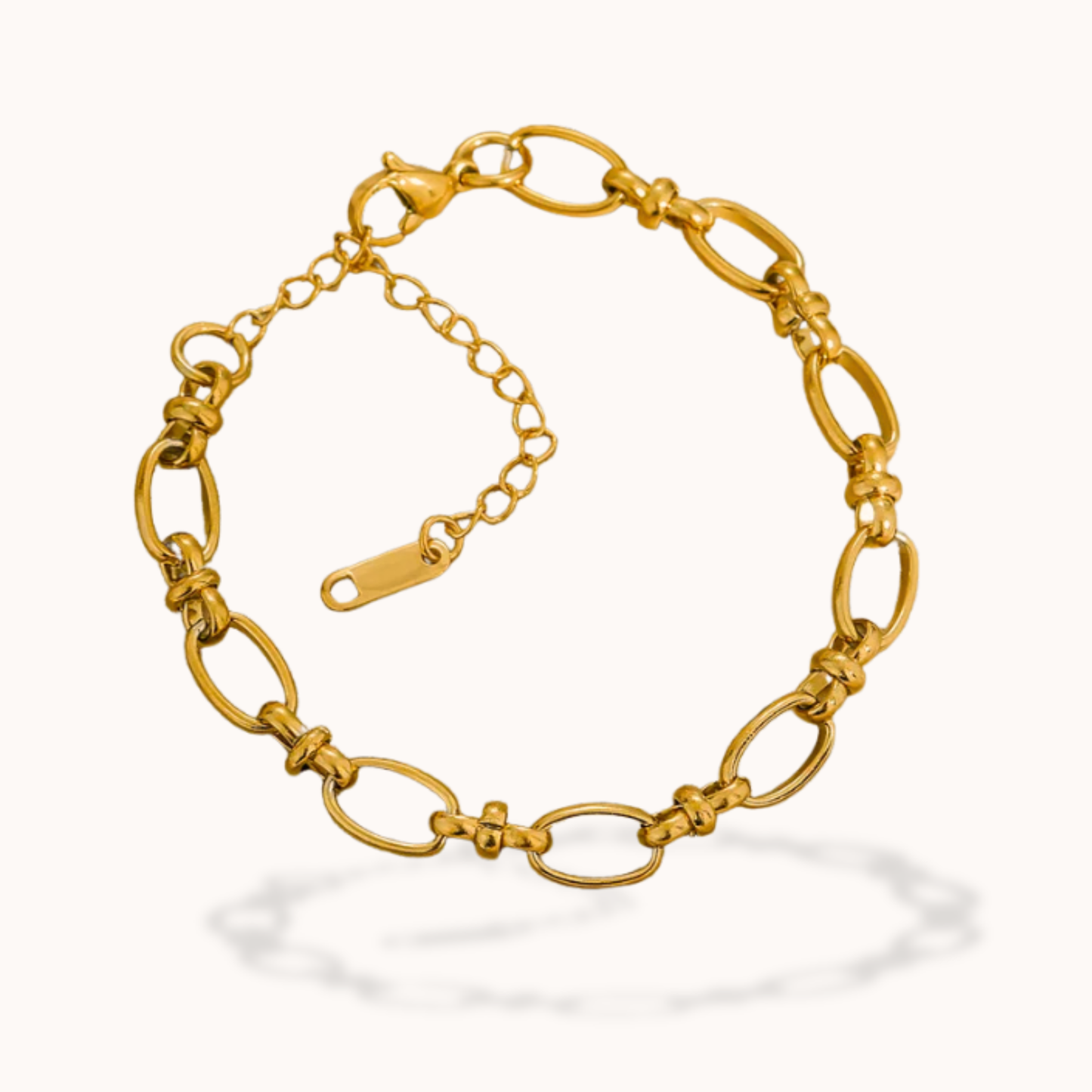 Gold chain bracelet on a white background