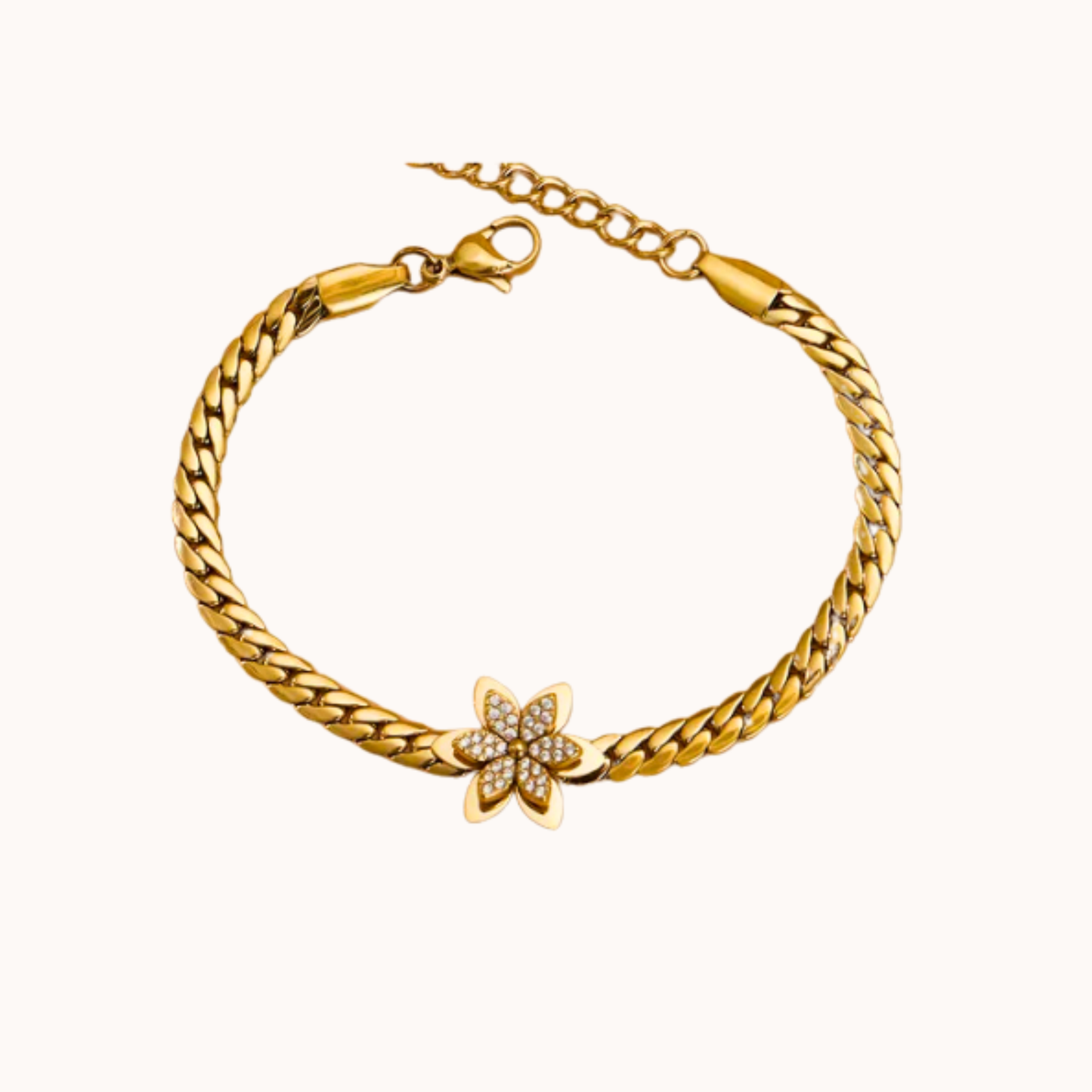 Gold bracelet with a starfish charm on a white background
