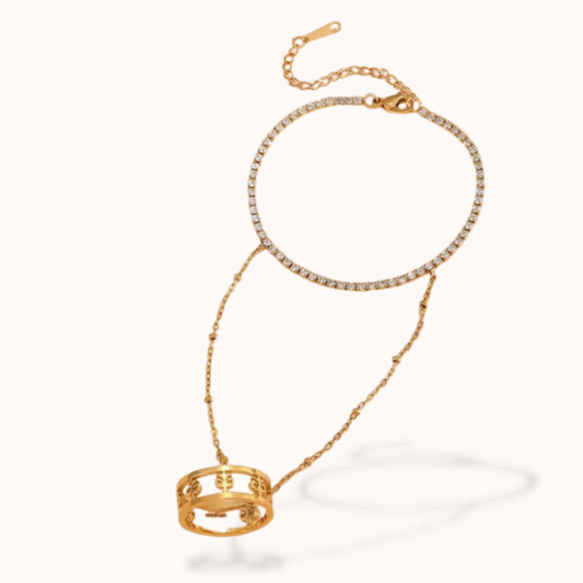 Gold necklace with a pendant on a white background