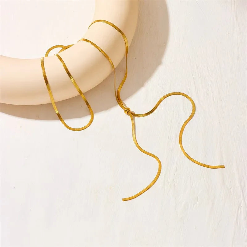 Gold hoop earring on a white background
