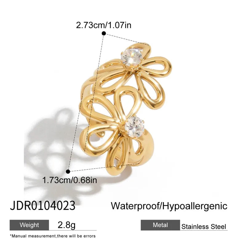 Gold ring with butterfly design and measurements on a white background