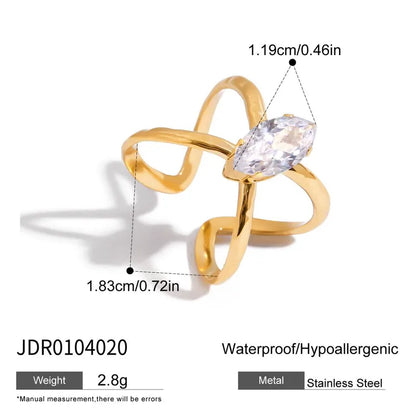 Gold ring with a clear gemstone, showing measurements and product details on a white background.