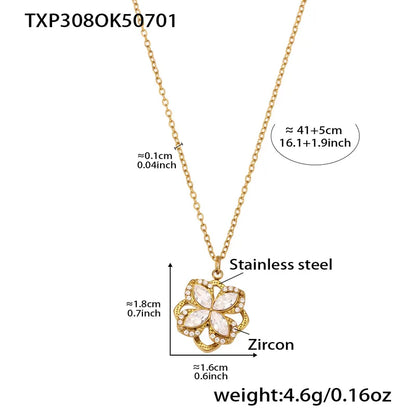 Gold necklace with floral pendant and measurements on a white background