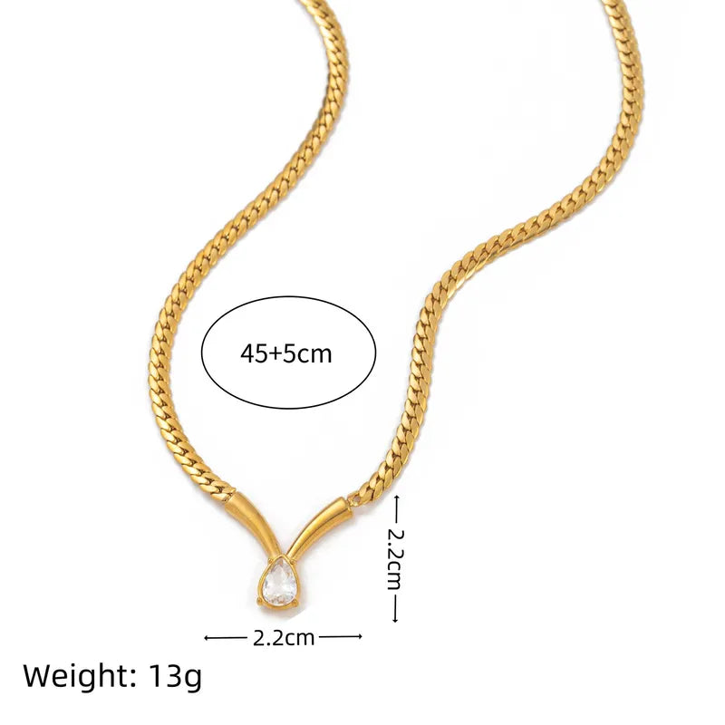 Gold necklace with measurements and weight details on a white background