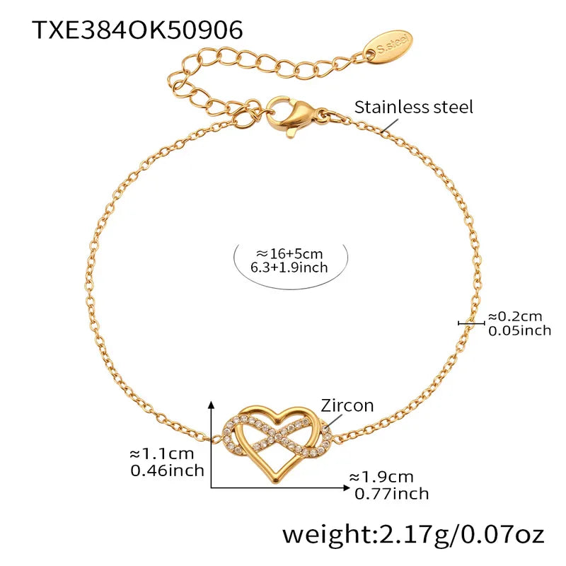 Gold bracelet with heart design and measurements on a white background