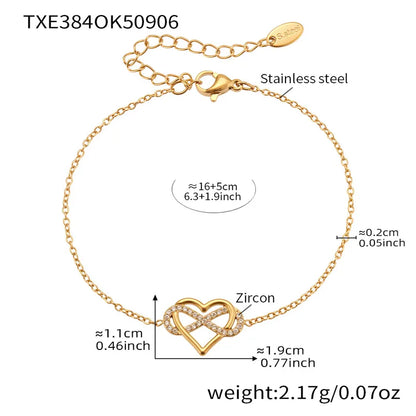 Gold bracelet with heart design and measurements on a white background