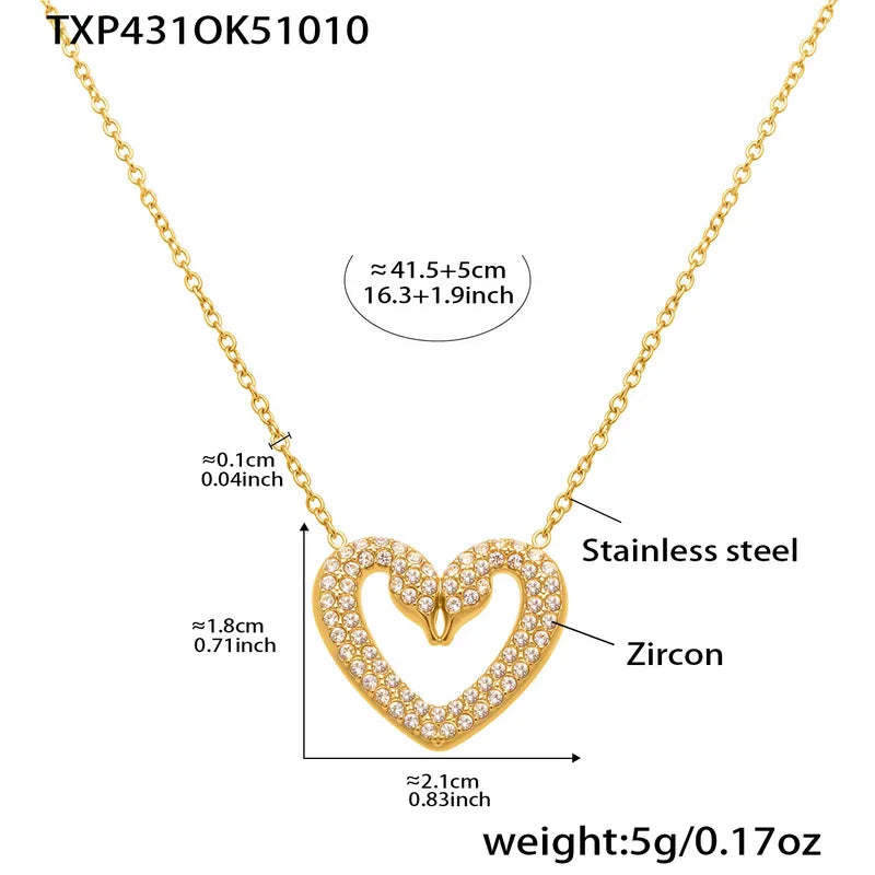 Gold heart-shaped necklace with measurements and material details on a white background