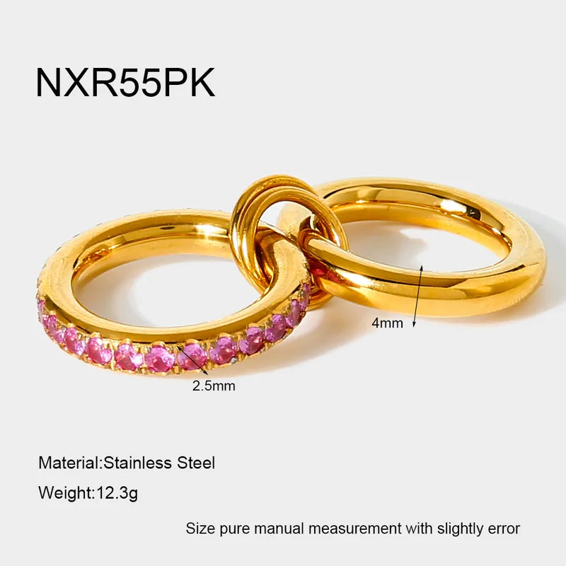 Gold ring with pink gemstones on a white background, featuring measurements and material details.
