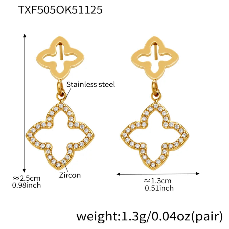 Gold earrings with zircon stones and measurements on a white background