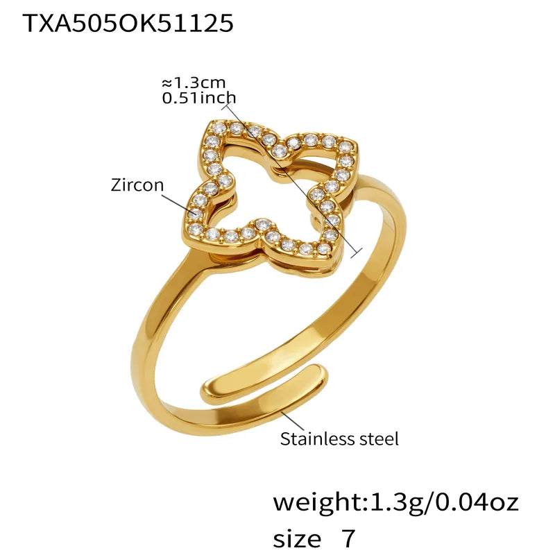 Gold ring with zircon details and specifications on a white background