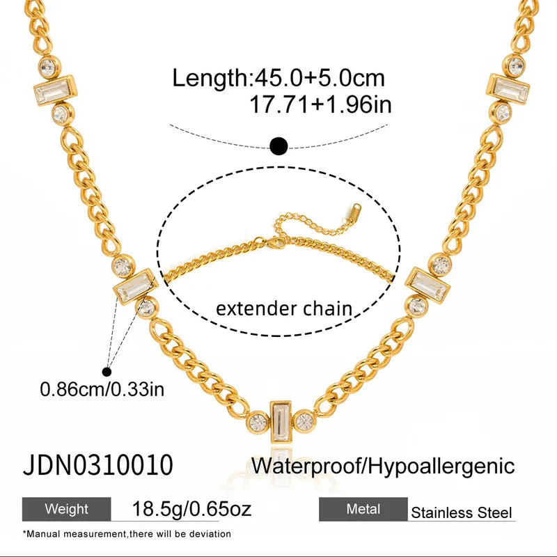 Gold necklace with extender chain on a white background