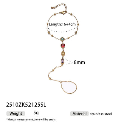 Gold necklace with gemstones and measurements on a white background