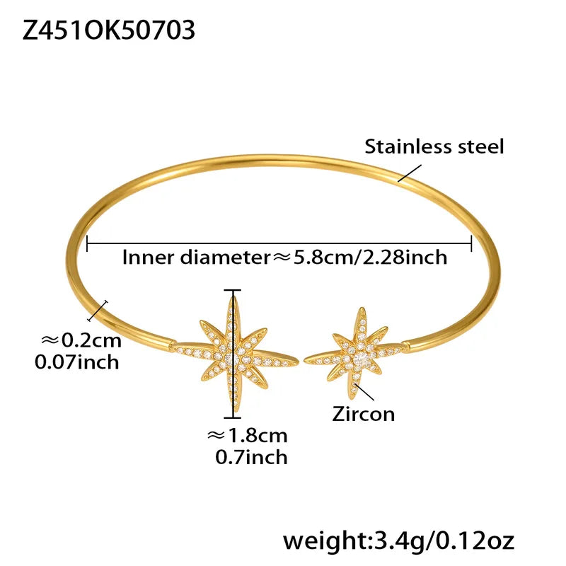 Gold bracelet with starfish designs and measurements on a white background