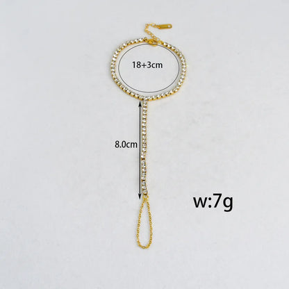 Gold chain with measurements on a white background