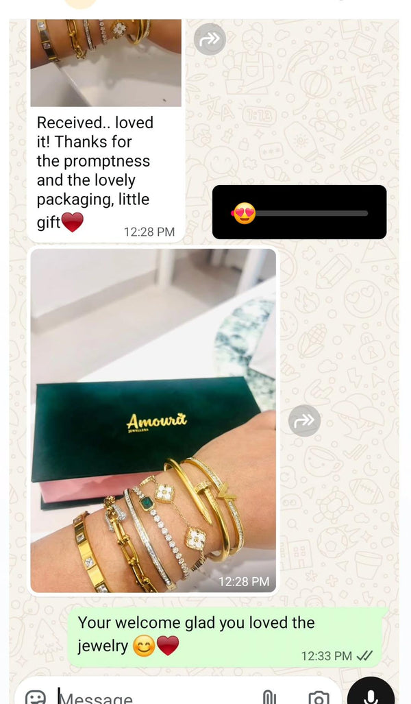 Jewelry with 'Amoura Jewellers' packaging and text feedback on a light background